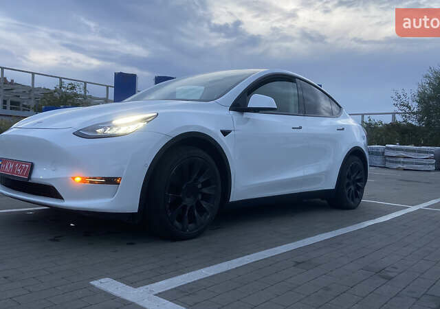 Белый Тесла Model Y, объемом двигателя 0 л и пробегом 81 тыс. км за 25000 $, фото 1 на Automoto.ua