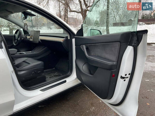Білий Тесла Model Y, об'ємом двигуна 0 л та пробігом 88 тис. км за 24900 $, фото 28 на Automoto.ua