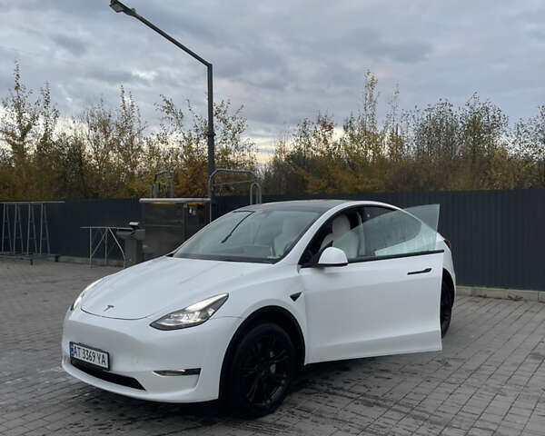Белый Тесла Model Y, объемом двигателя 0 л и пробегом 55 тыс. км за 28000 $, фото 12 на Automoto.ua