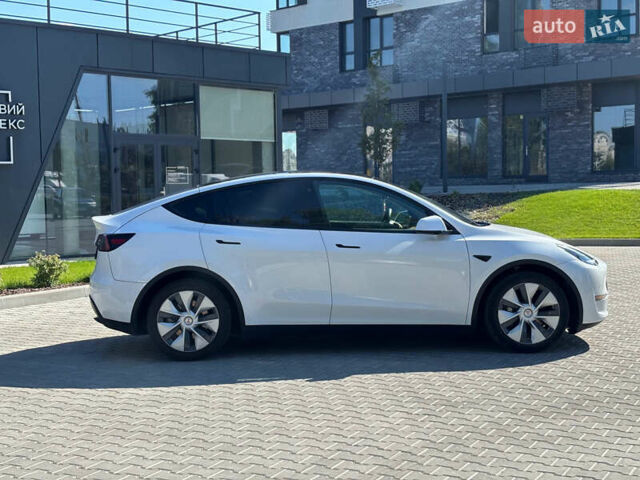 Белый Тесла Model Y, объемом двигателя 0 л и пробегом 86 тыс. км за 23999 $, фото 5 на Automoto.ua