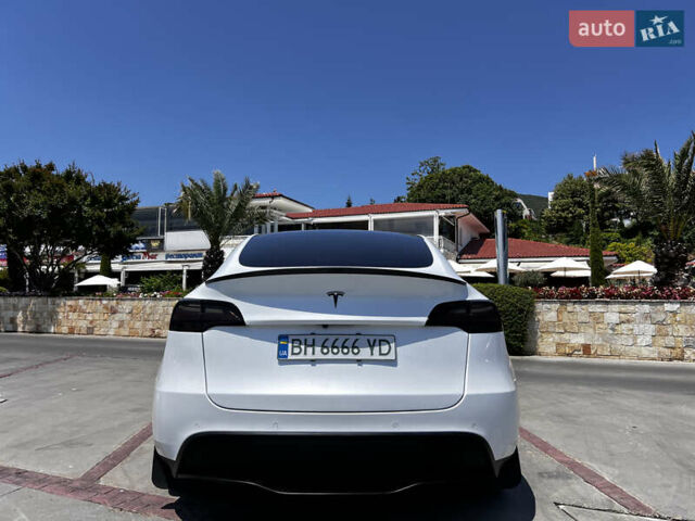 Белый Тесла Model Y, объемом двигателя 0 л и пробегом 61 тыс. км за 28000 $, фото 11 на Automoto.ua