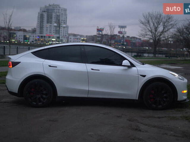 Білий Тесла Model Y, об'ємом двигуна 0 л та пробігом 66 тис. км за 23500 $, фото 4 на Automoto.ua