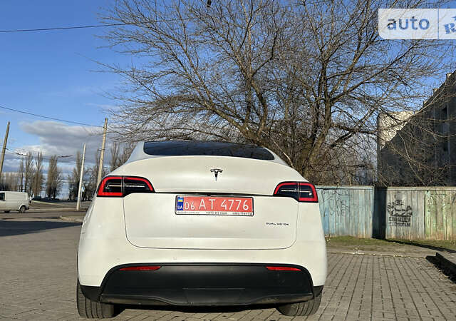 Білий Тесла Model Y, об'ємом двигуна 0 л та пробігом 61 тис. км за 33500 $, фото 21 на Automoto.ua