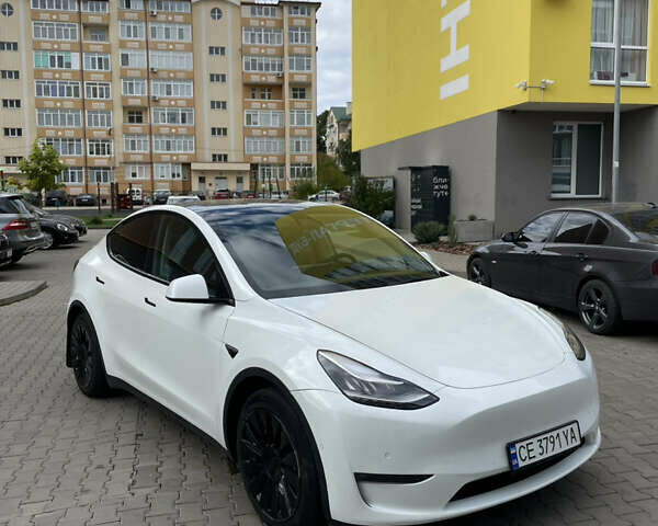 Белый Тесла Model Y, объемом двигателя 0 л и пробегом 65 тыс. км за 22999 $, фото 2 на Automoto.ua
