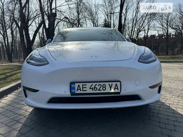 Белый Тесла Model Y, объемом двигателя 0 л и пробегом 56 тыс. км за 40500 $, фото 35 на Automoto.ua