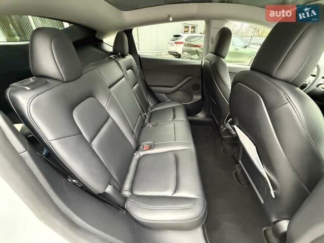 Белый Тесла Model Y, объемом двигателя 0 л и пробегом 68 тыс. км за 24900 $, фото 24 на Automoto.ua
