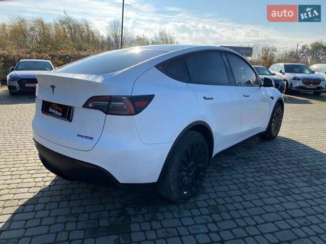 Білий Тесла Model Y, об'ємом двигуна 0 л та пробігом 54 тис. км за 21900 $, фото 6 на Automoto.ua