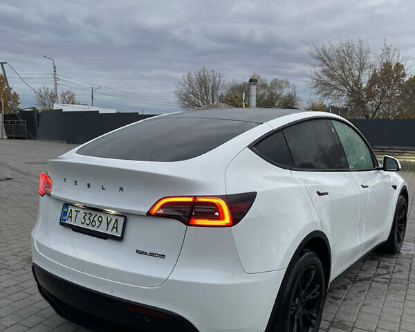 Белый Тесла Model Y, объемом двигателя 0 л и пробегом 55 тыс. км за 28000 $, фото 6 на Automoto.ua