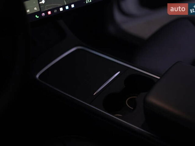 Білий Тесла Model Y, об'ємом двигуна 0 л та пробігом 66 тис. км за 23500 $, фото 53 на Automoto.ua