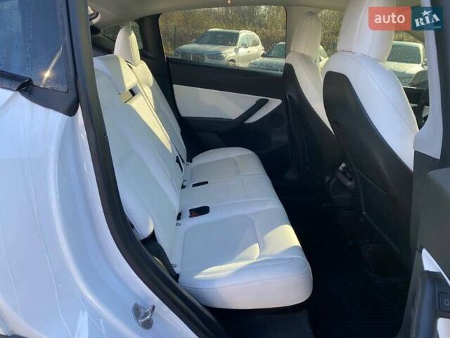 Білий Тесла Model Y, об'ємом двигуна 0 л та пробігом 54 тис. км за 21900 $, фото 19 на Automoto.ua