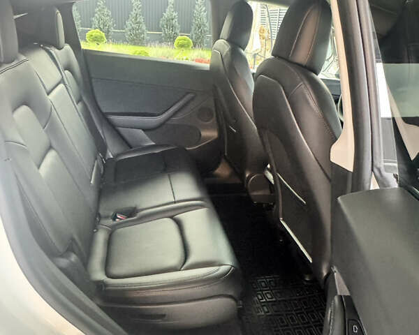 Білий Тесла Model Y, об'ємом двигуна 0 л та пробігом 72 тис. км за 29900 $, фото 5 на Automoto.ua