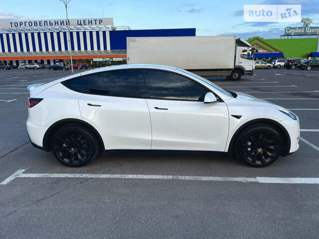 Белый Тесла Model Y, объемом двигателя 0 л и пробегом 97 тыс. км за 34500 $, фото 2 на Automoto.ua