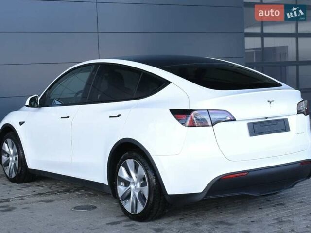 Белый Тесла Model Y, объемом двигателя 0 л и пробегом 71 тыс. км за 23000 $, фото 2 на Automoto.ua
