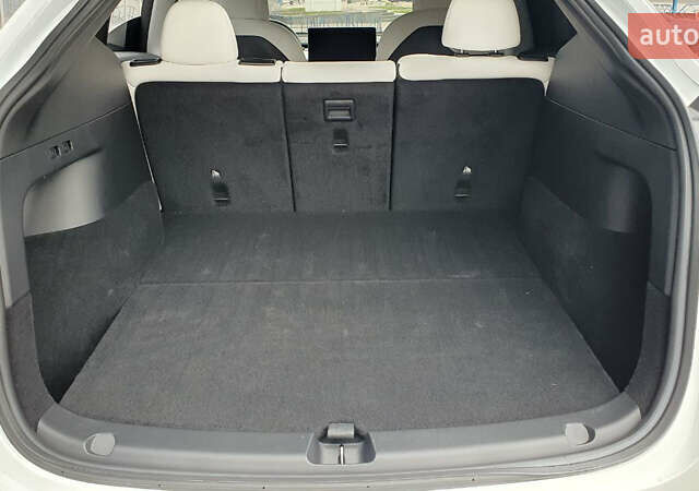 Білий Тесла Model Y, об'ємом двигуна 0 л та пробігом 74 тис. км за 25900 $, фото 22 на Automoto.ua