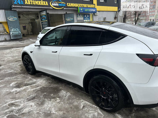 Белый Тесла Model Y, объемом двигателя 0 л и пробегом 57 тыс. км за 36900 $, фото 6 на Automoto.ua