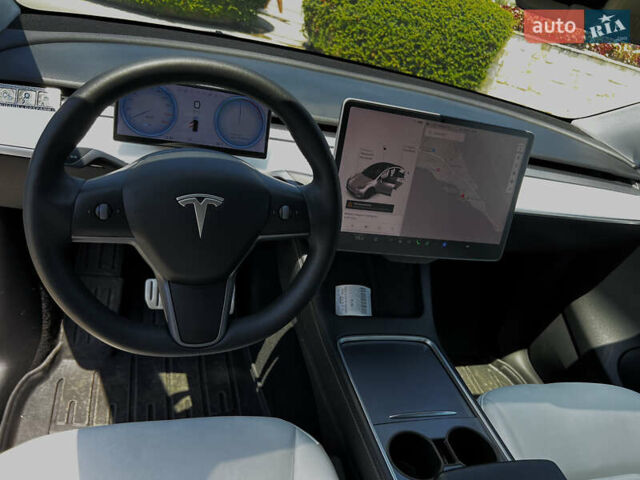 Белый Тесла Model Y, объемом двигателя 0 л и пробегом 61 тыс. км за 28000 $, фото 24 на Automoto.ua