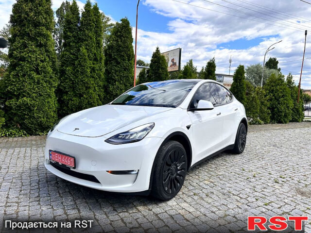 Белый Тесла Model Y, объемом двигателя 0.26 л и пробегом 80 тыс. км за 21500 $, фото 1 на Automoto.ua