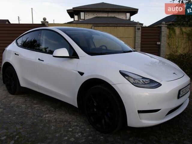 Белый Тесла Model Y, объемом двигателя 0 л и пробегом 103 тыс. км за 28400 $, фото 1 на Automoto.ua