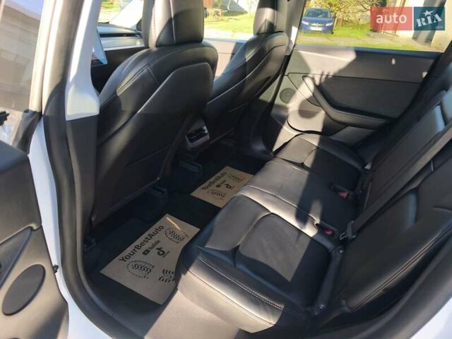 Білий Тесла Model Y, об'ємом двигуна 0 л та пробігом 86 тис. км за 25300 $, фото 17 на Automoto.ua