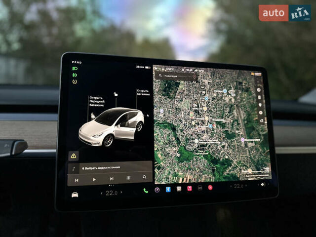 Белый Тесла Model Y, объемом двигателя 0 л и пробегом 57 тыс. км за 30000 $, фото 18 на Automoto.ua