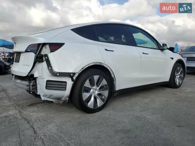Белый Тесла Model Y, объемом двигателя 0 л и пробегом 43 тыс. км за 10000 $, фото 2 на Automoto.ua