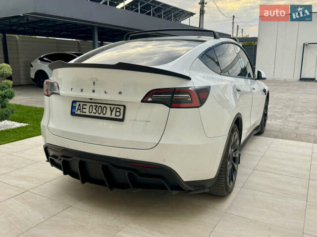 Белый Тесла Model Y, объемом двигателя 0 л и пробегом 180 тыс. км за 23000 $, фото 4 на Automoto.ua