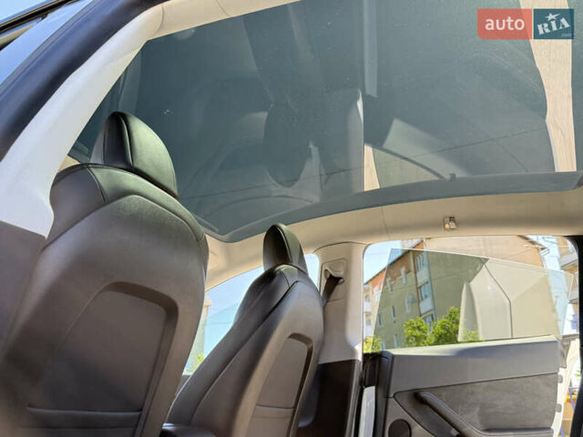 Белый Тесла Model Y, объемом двигателя 0 л и пробегом 110 тыс. км за 27750 $, фото 33 на Automoto.ua