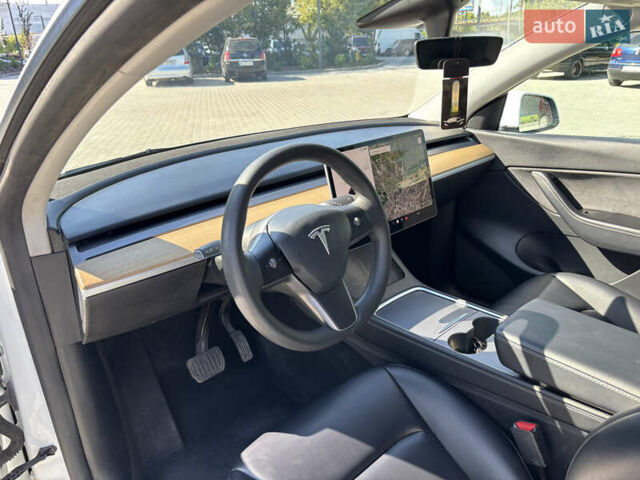 Белый Тесла Model Y, объемом двигателя 0 л и пробегом 86 тыс. км за 23999 $, фото 6 на Automoto.ua