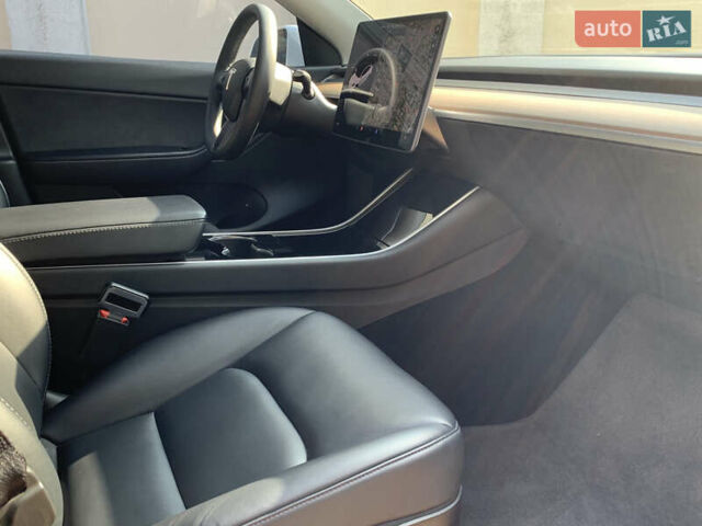 Белый Тесла Model Y, объемом двигателя 0 л и пробегом 52 тыс. км за 21900 $, фото 25 на Automoto.ua