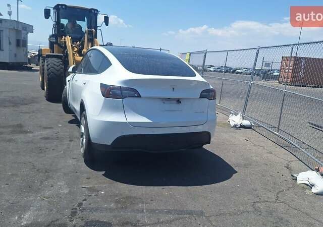 Білий Тесла Model Y, об'ємом двигуна 0 л та пробігом 84 тис. км за 15800 $, фото 27 на Automoto.ua