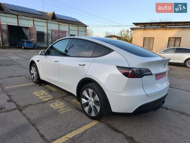 Білий Тесла Model Y, об'ємом двигуна 0 л та пробігом 86 тис. км за 25300 $, фото 5 на Automoto.ua