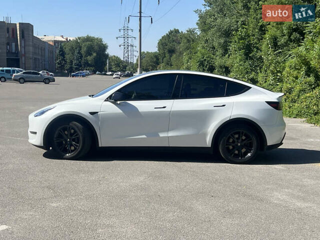 Белый Тесла Model Y, объемом двигателя 0 л и пробегом 63 тыс. км за 25500 $, фото 1 на Automoto.ua