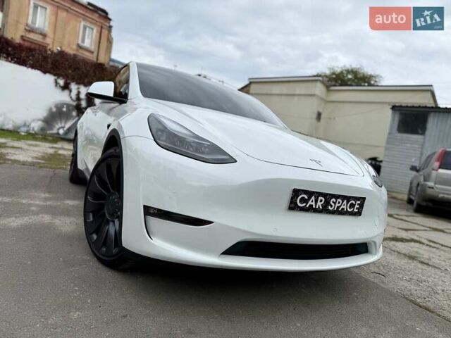 Белый Тесла Model Y, объемом двигателя 0 л и пробегом 88 тыс. км за 26999 $, фото 6 на Automoto.ua