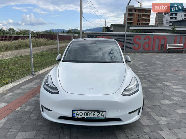Белый Тесла Model Y, объемом двигателя 0 л и пробегом 49 тыс. км за 27500 $, фото 2 на Automoto.ua