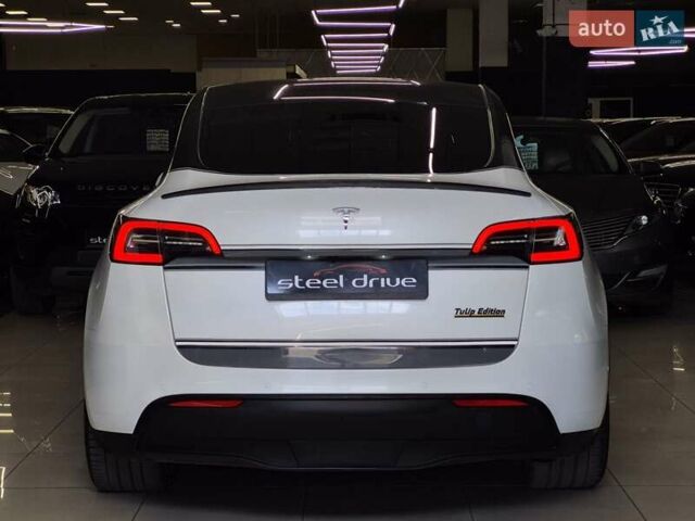 Белый Тесла Model Y, объемом двигателя 0 л и пробегом 58 тыс. км за 26999 $, фото 5 на Automoto.ua