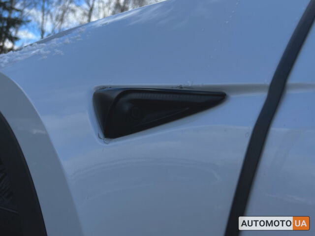Белый Тесла Model Y, объемом двигателя 82 л и пробегом 78 тыс. км за 26900 $, фото 20 на Automoto.ua