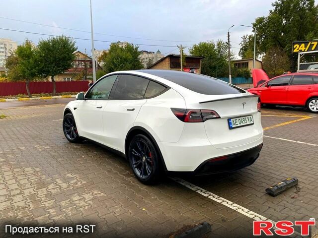 Тесла Model Y 2021 в Ирпене на Automoto.ua Белый Тесла Model Y, объемом двигателя 0 л и пробегом 80 тыс. км за 26700 $, фото 4 на Automoto.ua
