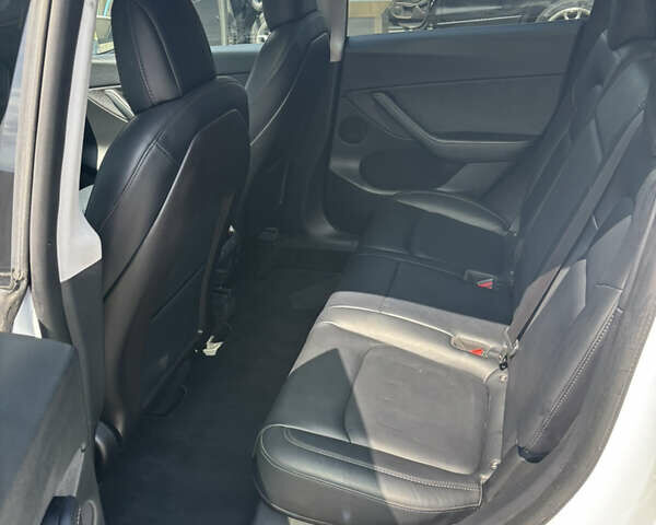 Белый Тесла Model Y, объемом двигателя 0 л и пробегом 65 тыс. км за 22800 $, фото 7 на Automoto.ua