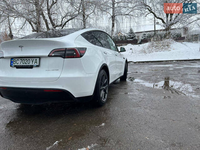 Білий Тесла Model Y, об'ємом двигуна 0 л та пробігом 88 тис. км за 24900 $, фото 1 на Automoto.ua