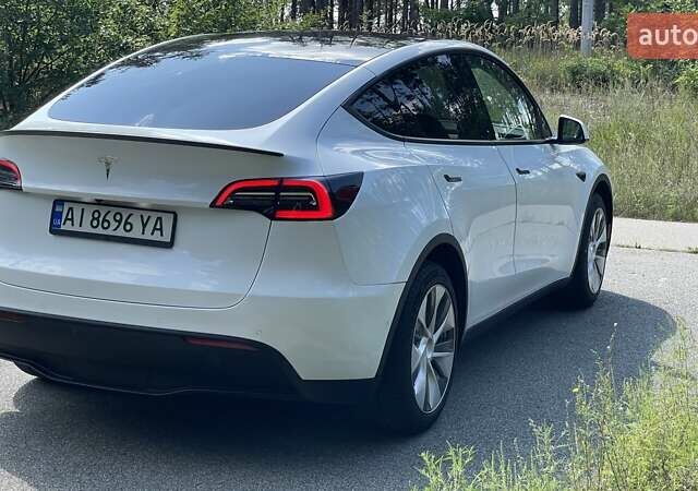 Белый Тесла Model Y, объемом двигателя 0 л и пробегом 65 тыс. км за 29999 $, фото 4 на Automoto.ua
