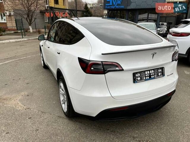 Білий Тесла Model Y, об'ємом двигуна 0 л та пробігом 47 тис. км за 23499 $, фото 52 на Automoto.ua