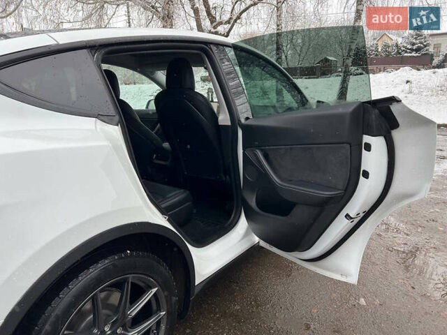 Білий Тесла Model Y, об'ємом двигуна 0 л та пробігом 88 тис. км за 24900 $, фото 26 на Automoto.ua