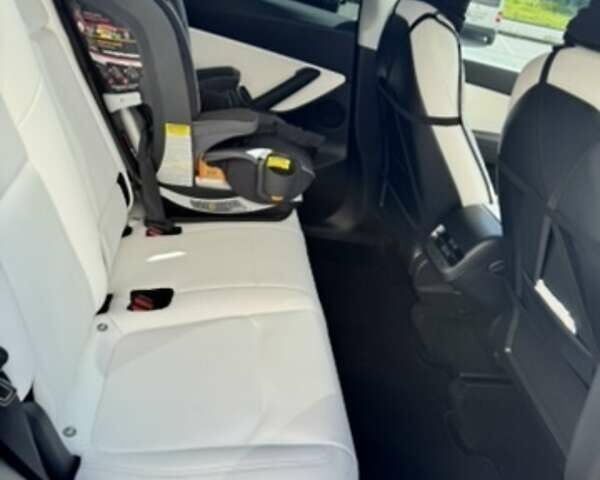 Белый Тесла Model Y, объемом двигателя 0 л и пробегом 128 тыс. км за 25900 $, фото 5 на Automoto.ua