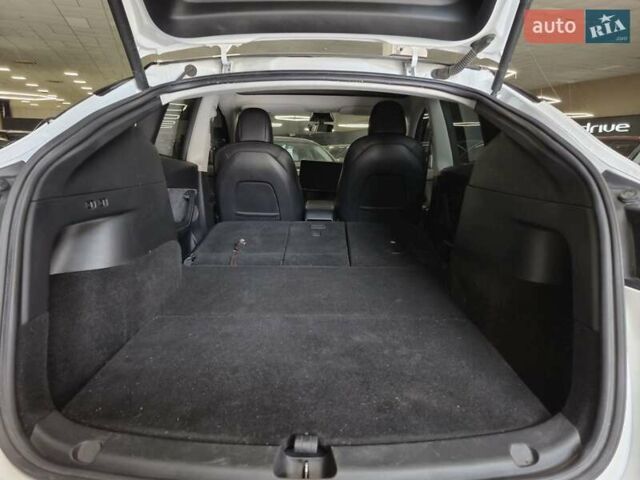 Білий Тесла Model Y, об'ємом двигуна 0 л та пробігом 58 тис. км за 26989 $, фото 12 на Automoto.ua