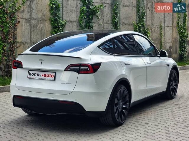 Белый Тесла Model Y, объемом двигателя 0 л и пробегом 98 тыс. км за 26499 $, фото 5 на Automoto.ua