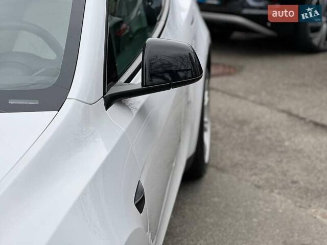Білий Тесла Model Y, об'ємом двигуна 0 л та пробігом 47 тис. км за 23499 $, фото 24 на Automoto.ua
