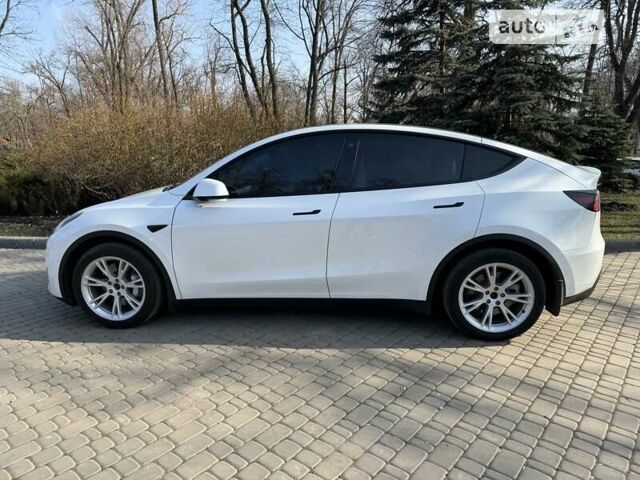 Белый Тесла Model Y, объемом двигателя 0 л и пробегом 56 тыс. км за 40500 $, фото 31 на Automoto.ua