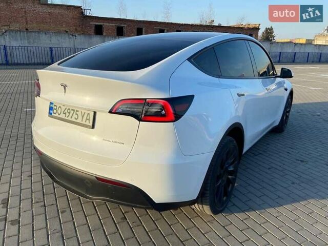 Білий Тесла Model Y, об'ємом двигуна 0 л та пробігом 41 тис. км за 24500 $, фото 1 на Automoto.ua