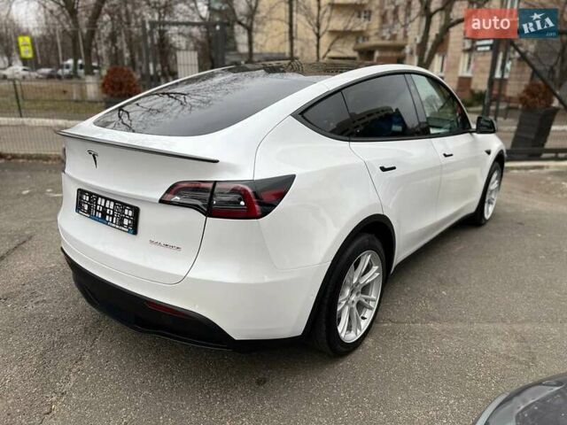 Білий Тесла Model Y, об'ємом двигуна 0 л та пробігом 47 тис. км за 23499 $, фото 25 на Automoto.ua