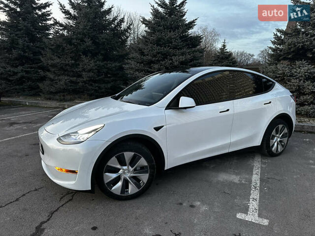 Белый Тесла Model Y, объемом двигателя 0 л и пробегом 55 тыс. км за 25450 $, фото 1 на Automoto.ua